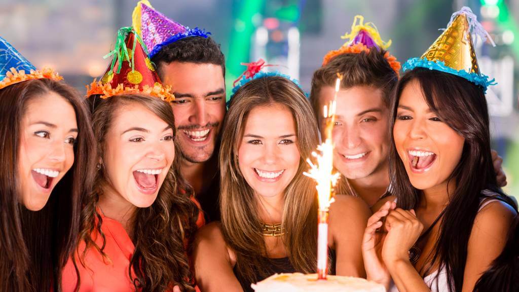 Friends celebrating at a birthday party