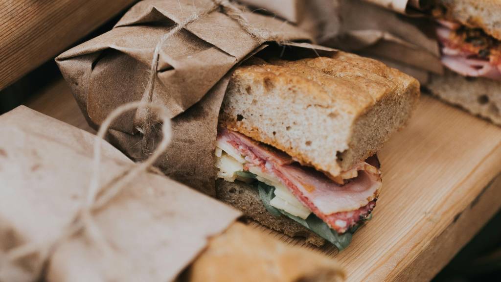 wrapped picnic sandwich on table