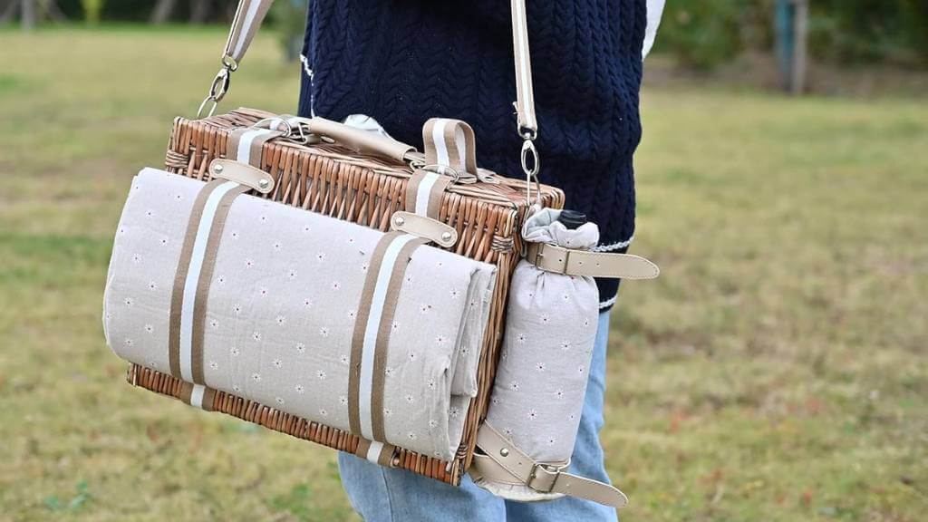 holding a picnic basket sets