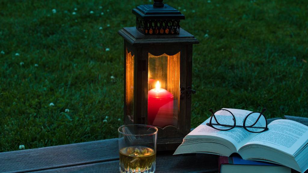 lantern with candle on picnic table