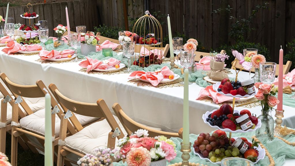 long brunch table with pink florals