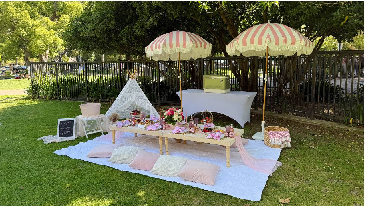 safe picnic setup with umbrellas