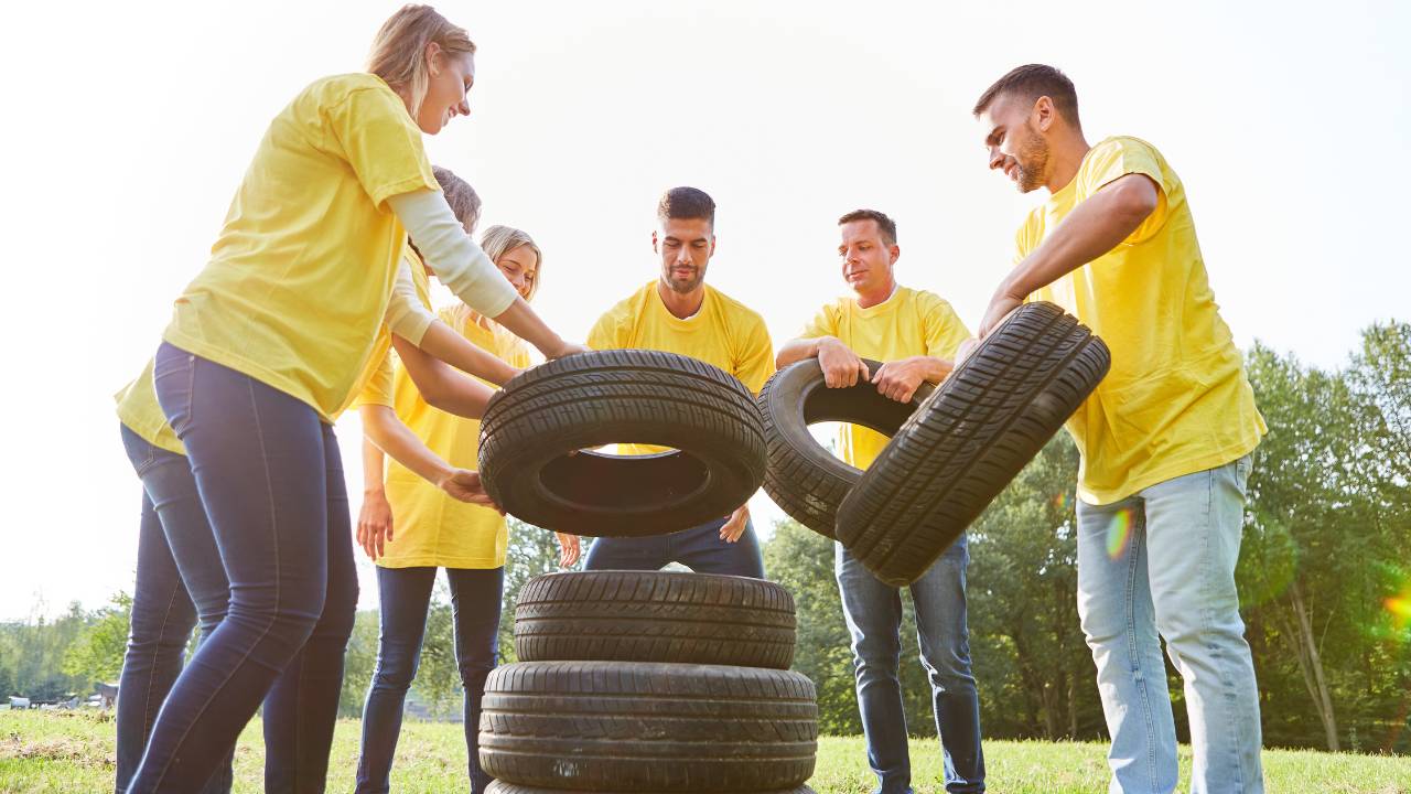 team stacking tires