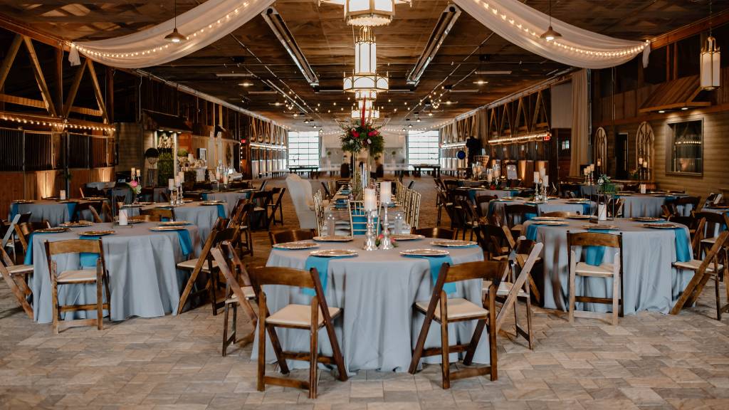 wedding reception with tables and plastic plates