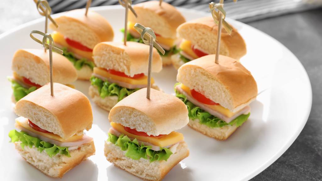 mini sandwiches on white plate