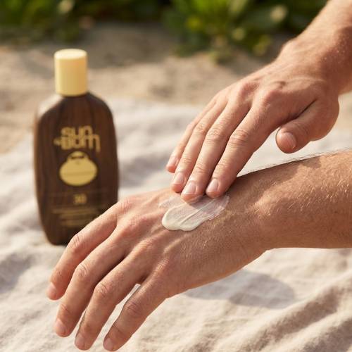 applying sunscreen lotion