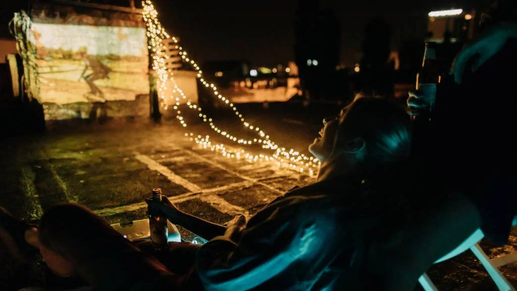 Rooftop movie screening proposal setup