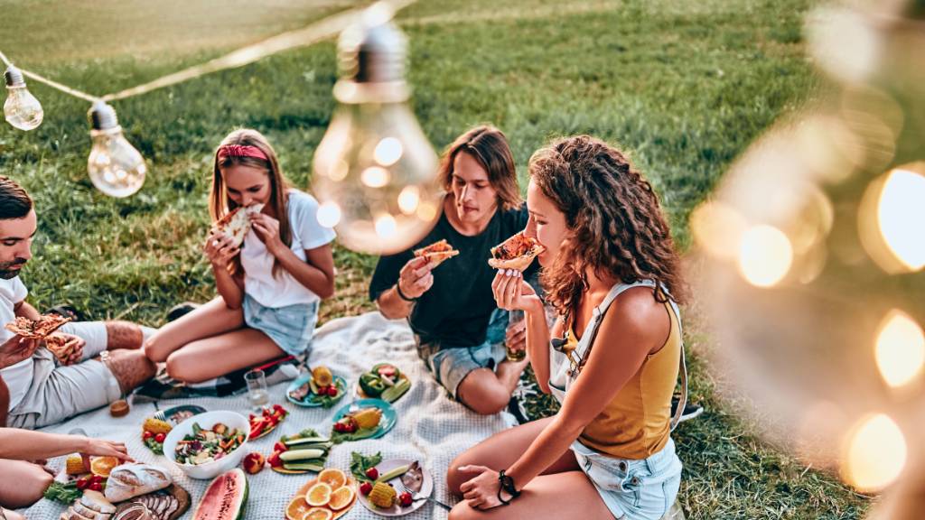 cozy picnic with lights and grazing board