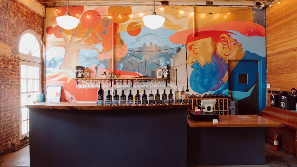 mural-lit wine tasting counter