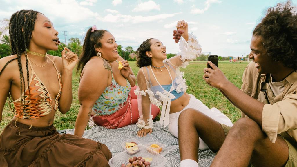 picnic guests sharing food and laughs