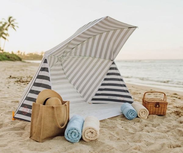striped beach umbrella shelter