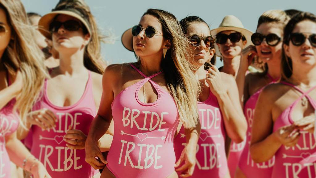 bride tribe in themed outfits