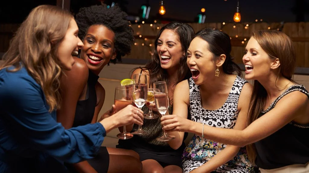 friends toasting at a divorce celebration
