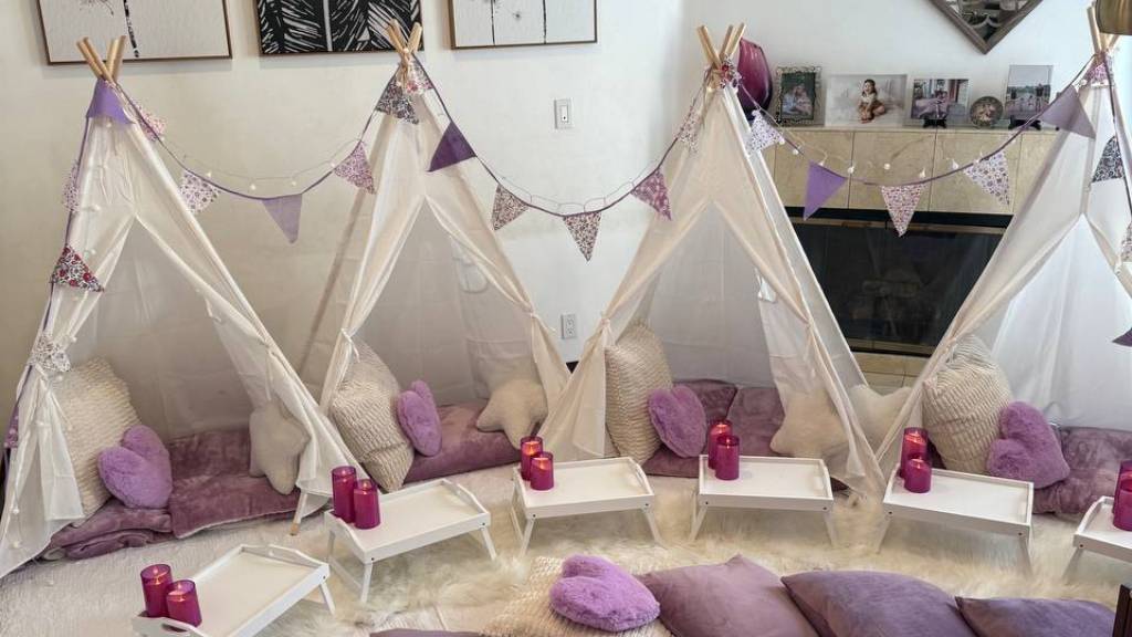 purple themed sleepover tents and heart pillows