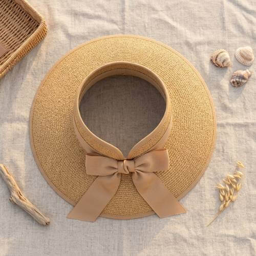 straw beach hat picnic setup