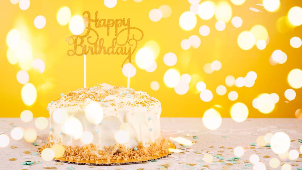 golden birthday cake with sparkles