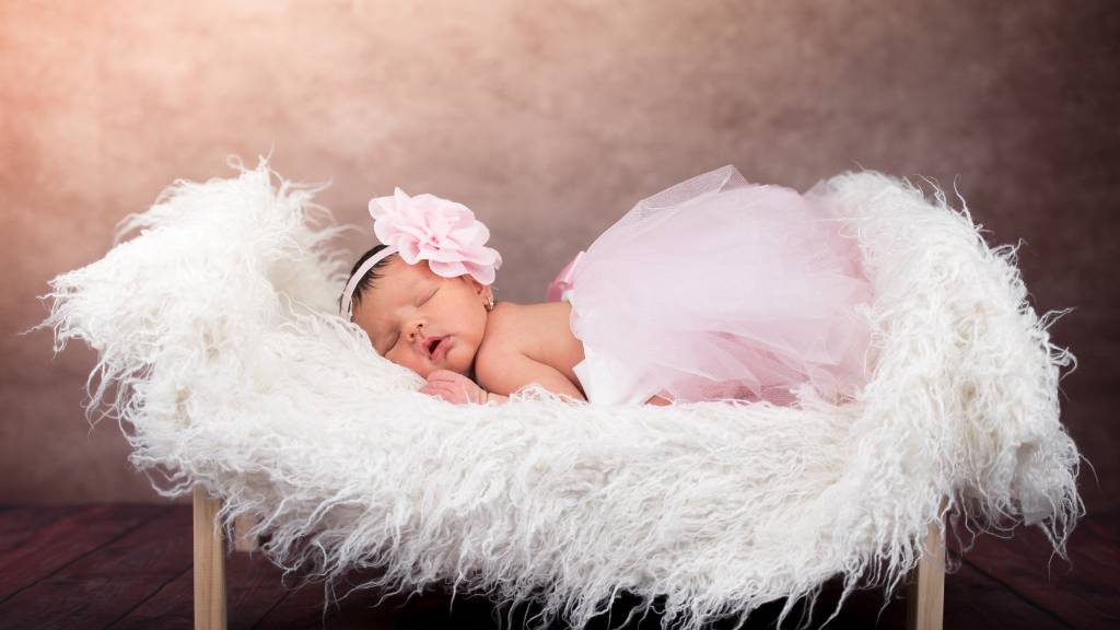 Newborn in white nest baby shower template