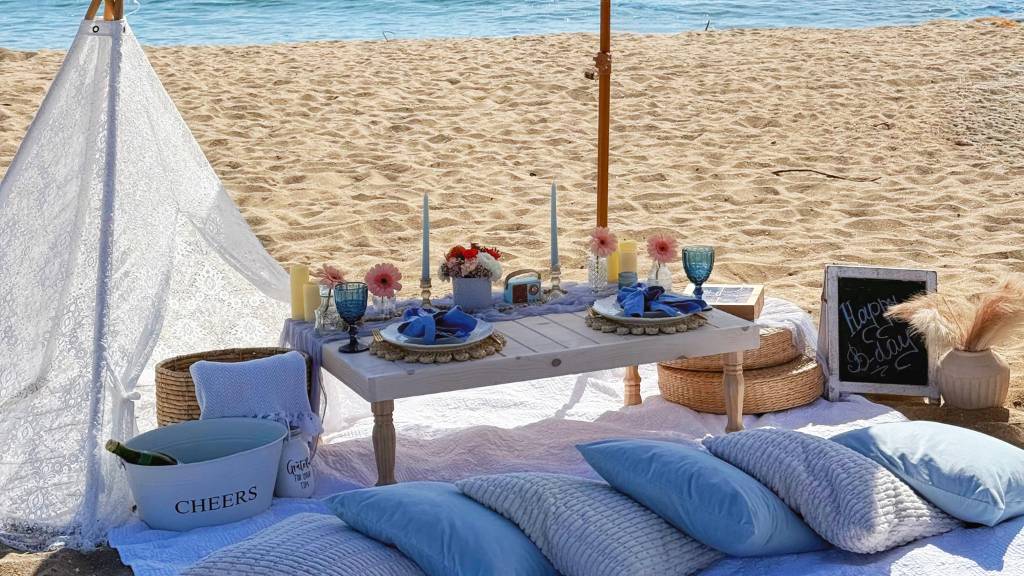 beach picnic setup with tent shade