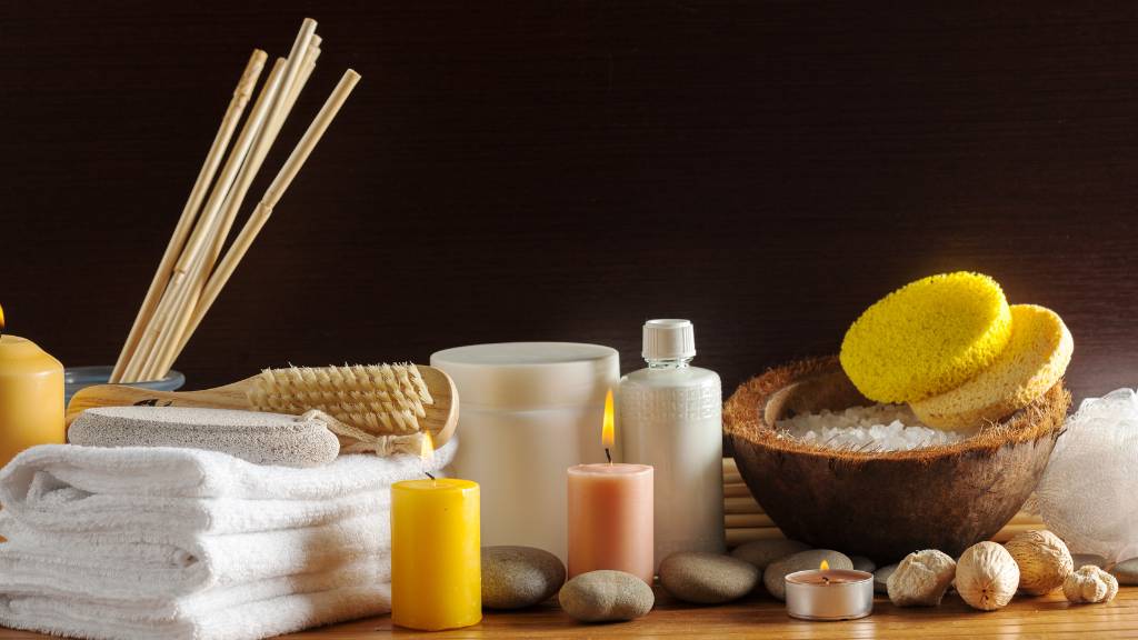 Spa essentials arranged on a table for a relaxing student pamper day.