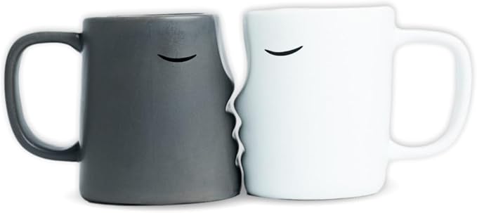 Hugging couple mugs in black and white
