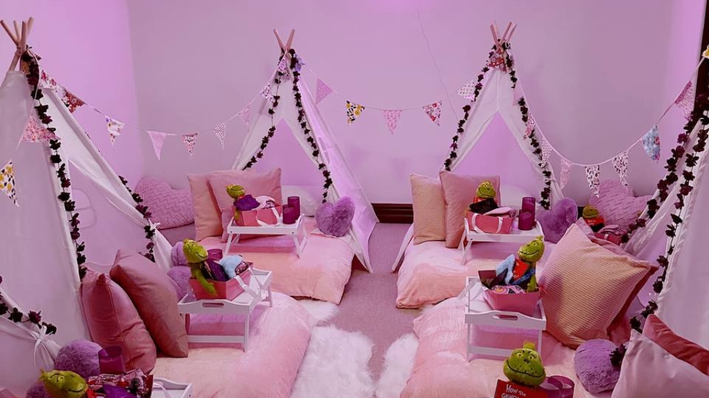 pink teepee sleepover tents with plush toys