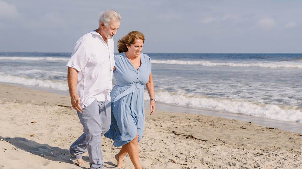 older married couple walking in godly love