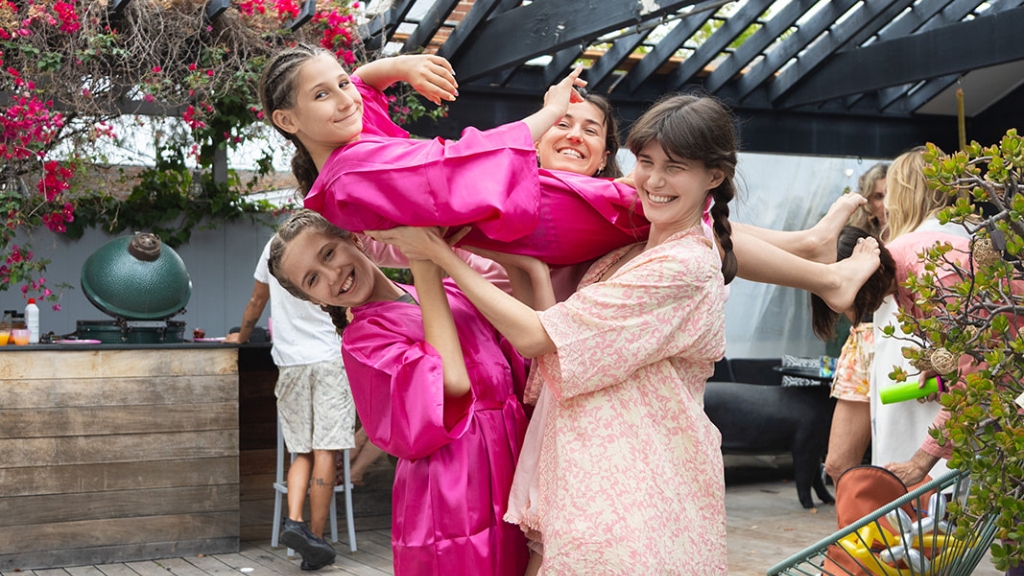 friends playing active games at teen sleepover