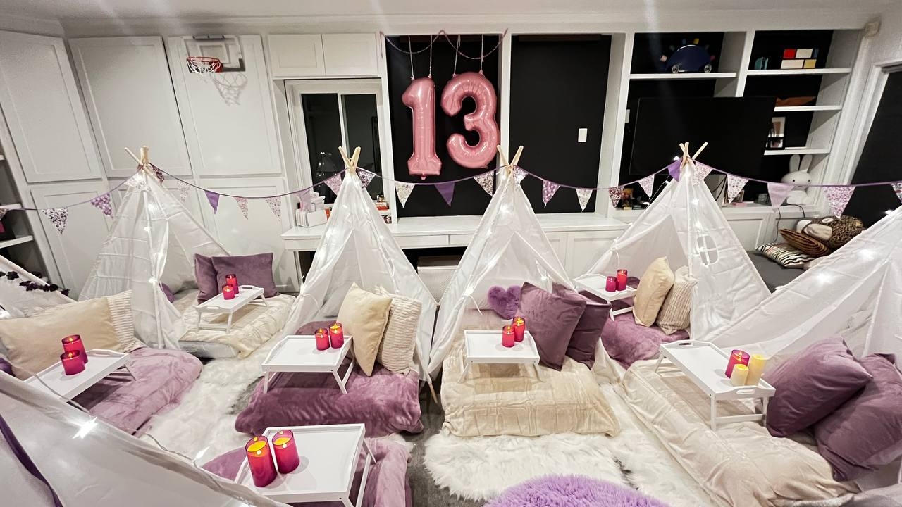 cozy sleepover tents with number 13 balloons