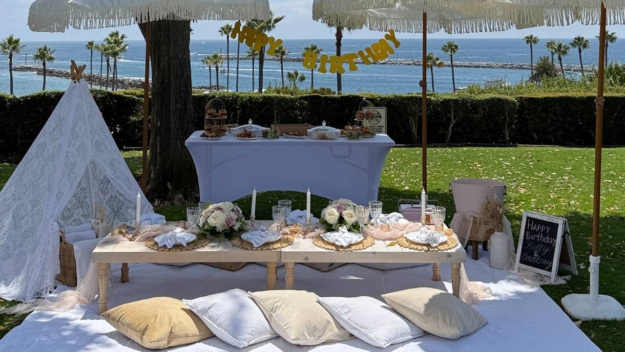 boho birthday party picnic by ocean