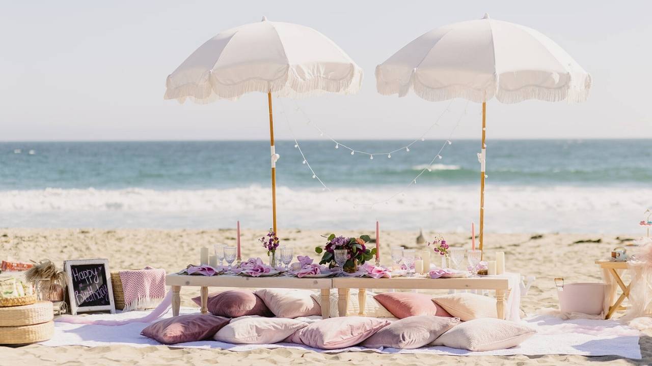beach picnic setup for joint birthday