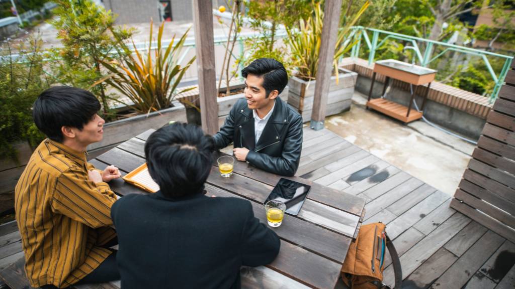 group outdoor meeting on patio