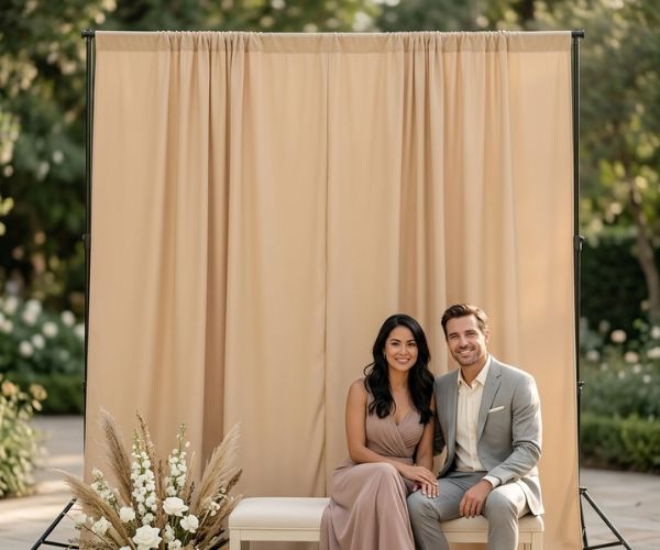 beige photo booth curtain at a minimalist wedding celebration